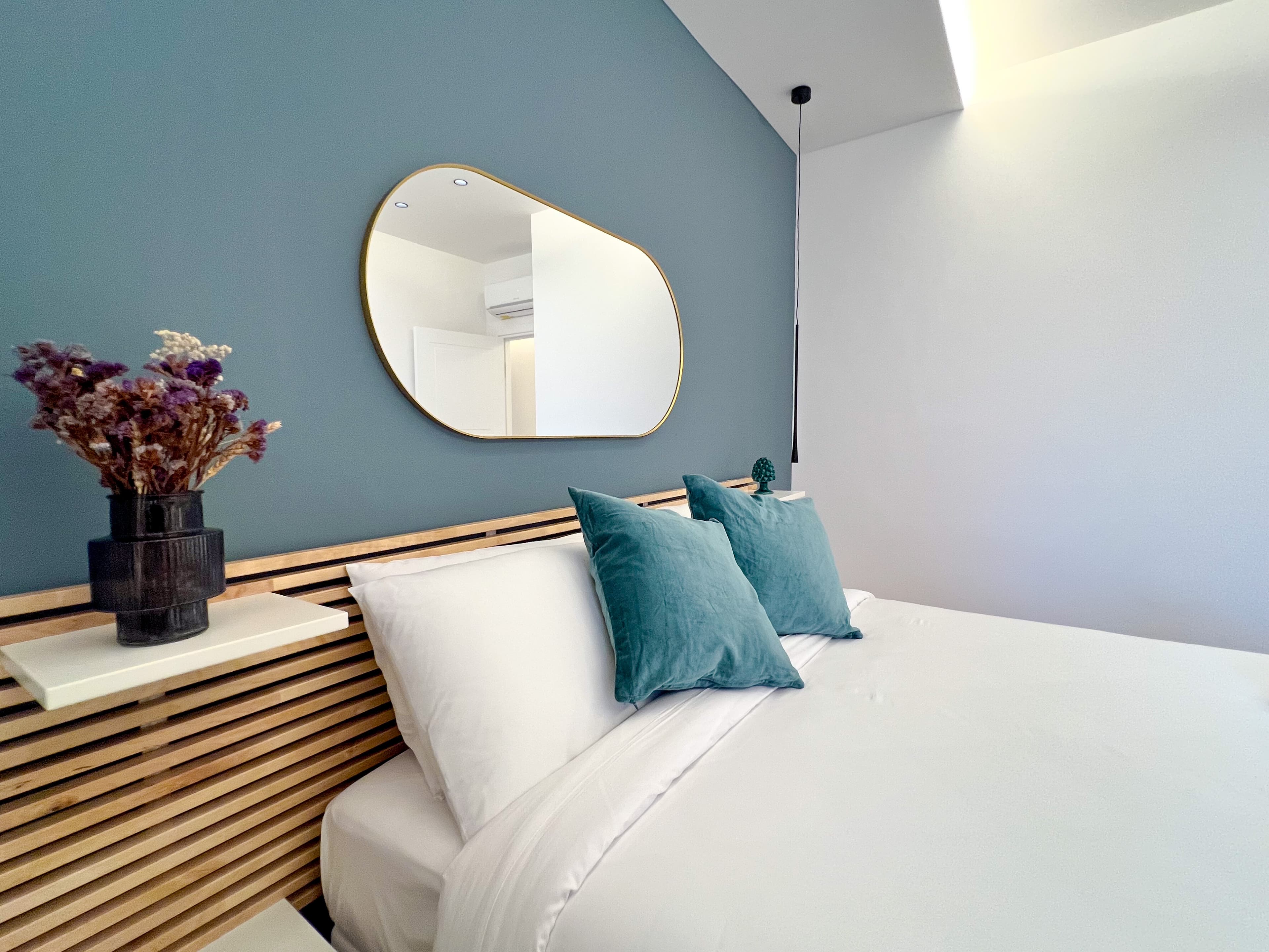 Turquoise apartment bedroom